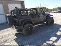 2014 Jeep Wrangler Unlimited — photo 4 of 10 | VIN 1C4BJWEG8EL116986