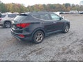 2017 Hyundai Santa Fe — photo 4 of 11 | VIN 5NMZUDLB8HH005782
