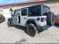 2023 Jeep Wrangler — photo 3 of 15 | VIN 1C4HJXDG9PW633488