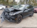 2018 Volkswagen Tiguan — photo 2 of 16 | VIN 3VV0B7AX4JM131706