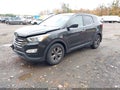 2016 Hyundai Santa Fe — photo 2 of 17 | VIN 5XYZUDLB2GG347401