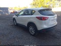 2014 Mazda CX-5 — photo 3 of 16 | VIN JM3KE4DY6E0419907