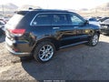 2014 Jeep Grand Cherokee — photo 4 of 16 | VIN 1C4RJFJGXEC355122