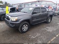 2014 Toyota Tacoma — photo 2 of 22 | VIN 3TMJU4GN7EM166876