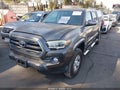 2017 Toyota Tacoma — photo 2 of 22 | VIN 5TFAX5GN1HX075940