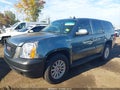 2009 GMC Yukon — photo 2 of 17 | VIN 1GKFK13539R119398