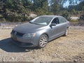 2014 Volkswagen Jetta — photo 2 of 15 | VIN 3VWD17AJ2EM359558