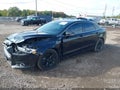 2014 Ford Fusion — photo 2 of 17 | VIN 3FA6P0H98ER134874