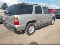 2004 GMC Yukon — photo 4 of 11 | VIN 1GKEC13VX4R164792