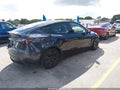2025 Tesla Model Y — photo 4 of 18 | VIN 7SAYGDED9SA373611