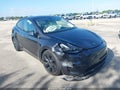 2025 Tesla Model Y — photo 6 of 18 | VIN 7SAYGDED9SA373611