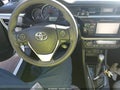 2016 Toyota Corolla — photo 11 of 17 | VIN 2T1BURHE9GC686332