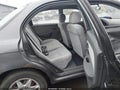 2003 Kia Spectra — photo 8 of 16 | VIN KNAFB121535283984