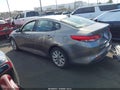 2016 Kia Optima — photo 3 of 12 | VIN 5XXGU4L3XGG047013