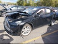 2024 Tesla Model Y — photo 2 of 15 | VIN 7SAYGDEE8RF079039