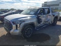 2023 Toyota Tundra — photo 2 of 12 | VIN 5TFJA5DB7PX088301