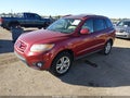 2011 Hyundai Santa Fe — photo 2 of 13 | VIN 5XYZK4AG9BG064958
