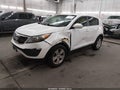2012 Kia Sportage — photo 2 of 14 | VIN KNDPBCA28C7229001