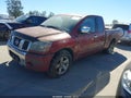 2004 Nissan Titan — photo 2 of 12 | VIN 1N6AA06A04N537670
