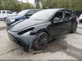 2021 Tesla Model Y — photo 2 of 15 | VIN 5YJYGDEF8MF197509