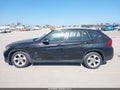 2014 BMW X1 — photo 17 of 19 | VIN WBAVM1C54EVW52795