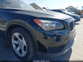 2014 BMW X1 — photo 14 of 19 | VIN WBAVM1C54EVW52795