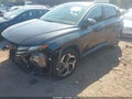 2022 Hyundai Tucson — photo 2 of 15 | VIN 5NMJF3AE3NH044810