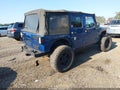 2010 Jeep Wrangler Unlimited — photo 4 of 16 | VIN 1J4BA5H17AL167594