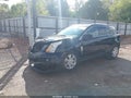 2016 Cadillac SRX — photo 2 of 16 | VIN 3GYFNDE32GS530778