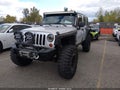 2011 Jeep Wrangler Unlimited — photo 2 of 17 | VIN 1J4BA3H17BL539487