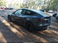 2022 Tesla Model Y — photo 3 of 15 | VIN 7SAYGDEE2NF413494