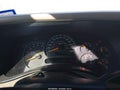 2004 Chevrolet Suburban 1500 — photo 7 of 11 | VIN 1GNEC16Z04J327000