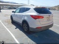 2015 Hyundai Santa Fe — photo 3 of 12 | VIN 5XYZU3LB1FG279584