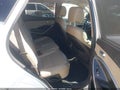 2015 Hyundai Santa Fe — photo 8 of 12 | VIN 5XYZU3LB1FG279584