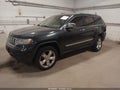 2012 Jeep Grand Cherokee — photo 2 of 16 | VIN 1C4RJFCG7CC272404