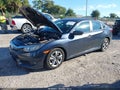 2016 Honda Civic — photo 2 of 16 | VIN 19XFC2F57GE066093