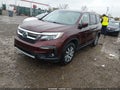 2021 Honda Pilot — photo 2 of 16 | VIN 5FNYF6H34MB072877