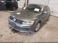 2015 Volkswagen Jetta — photo 2 of 13 | VIN 3VWLA7AJ3FM332611