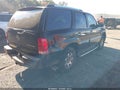 2003 Cadillac Escalade — photo 4 of 11 | VIN 1GYEK63N83R223004