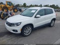 2012 Volkswagen Tiguan — photo 2 of 12 | VIN WVGAV7AX6CW518895