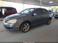 2008 Volkswagen Jetta — photo 2 of 12 | VIN 3VWRJ71K48M138210
