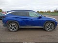 2023 Hyundai Tucson — photo 13 of 16 | VIN 5NMJFCAE8PH200701