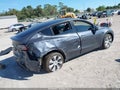 2023 Tesla Model Y — photo 4 of 15 | VIN 7SAYGDEE4PA122432