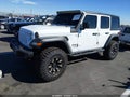 2020 Jeep Wrangler Unlimited — photo 2 of 18 | VIN 1C4HJXDG4LW104251
