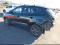 2014 Hyundai Tucson — photo 3 of 19 | VIN KM8JUCAG8EU789922
