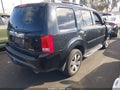 2014 Honda Pilot — photo 4 of 16 | VIN 5FNYF3H90EB009988