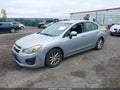 2014 Subaru Impreza — photo 2 of 11 | VIN JF1GJAC68EG023645