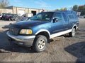 2002 Ford F-150 — photo 2 of 11 | VIN 1FTRX18L32NA43275