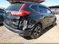 2019 Honda CR-V — photo 4 of 16 | VIN 5J6RW5H35KL000458