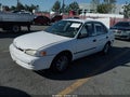 2000 Toyota Corolla — photo 2 of 12 | VIN 1NXBR12EXYZ361653